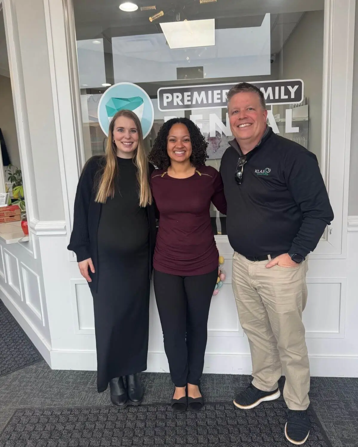 Phil Cole with the team at Premier Family Dental after their transition