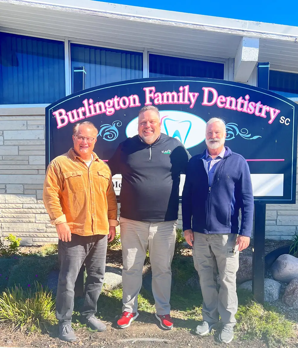 The KLAS team with the owners of Burlington Family Dentistry after their transition