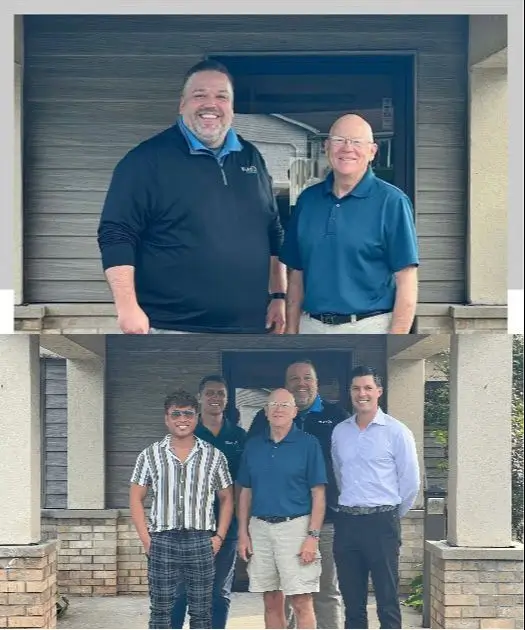 Daniel Cole of KLAS Solutions with clients at a completed practice transition