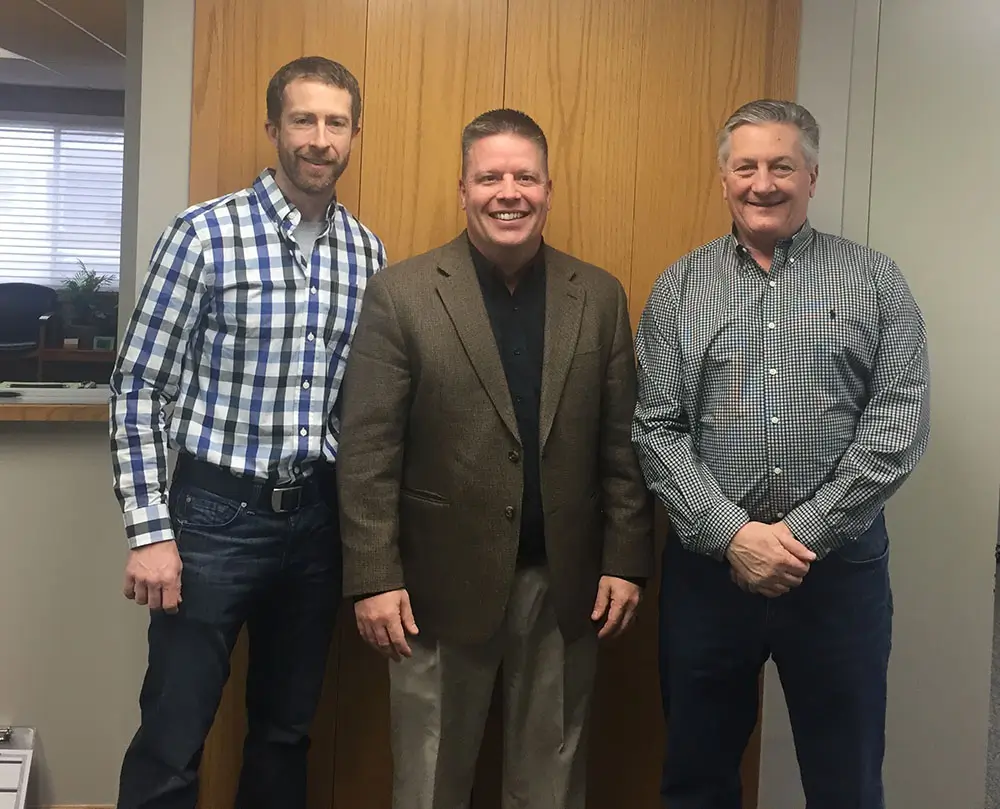 Dr. Smith, the buyer, with the seller and the KLAS team after his practice acquisition